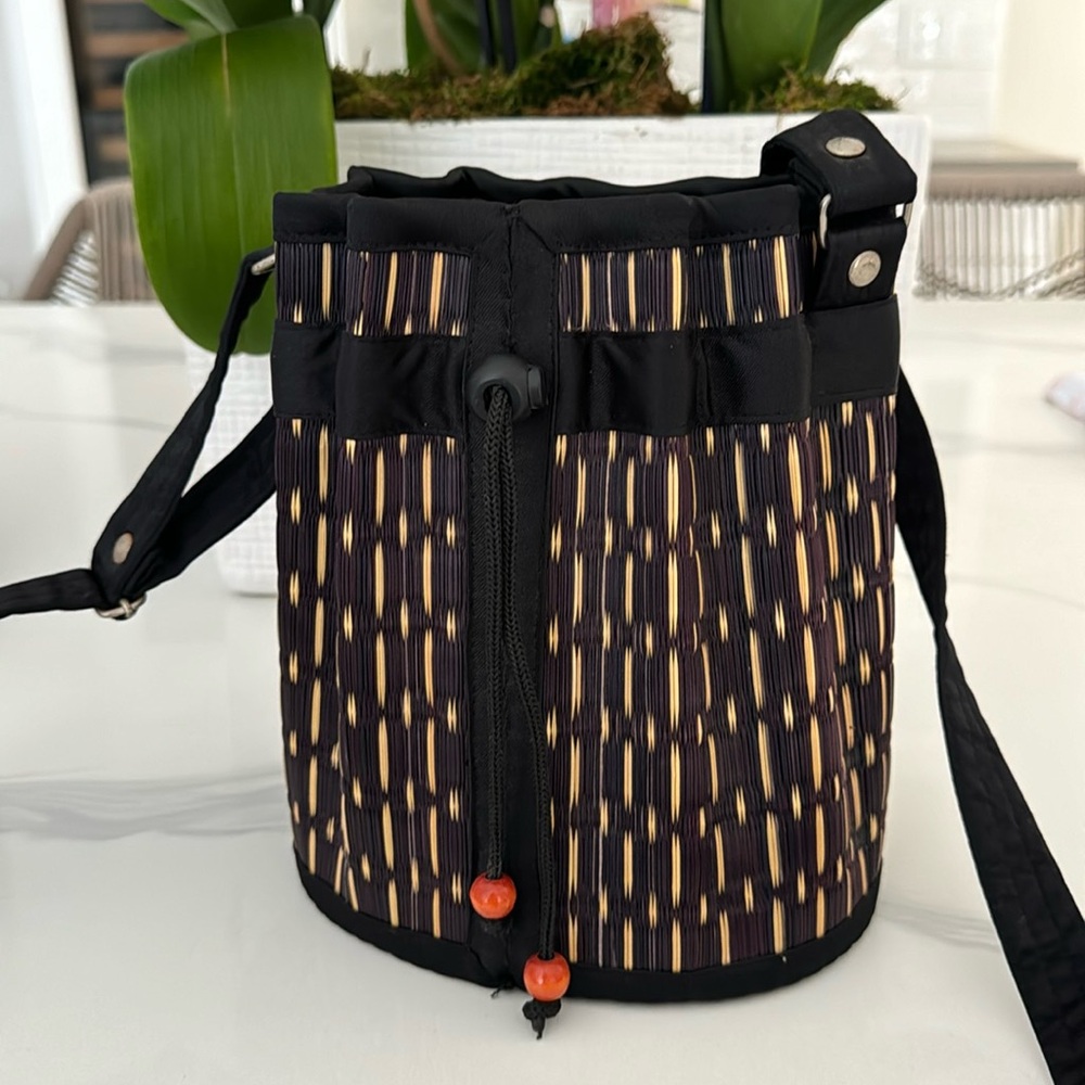 Saraye Black and Tan Bucket Bag with long adjustable strap